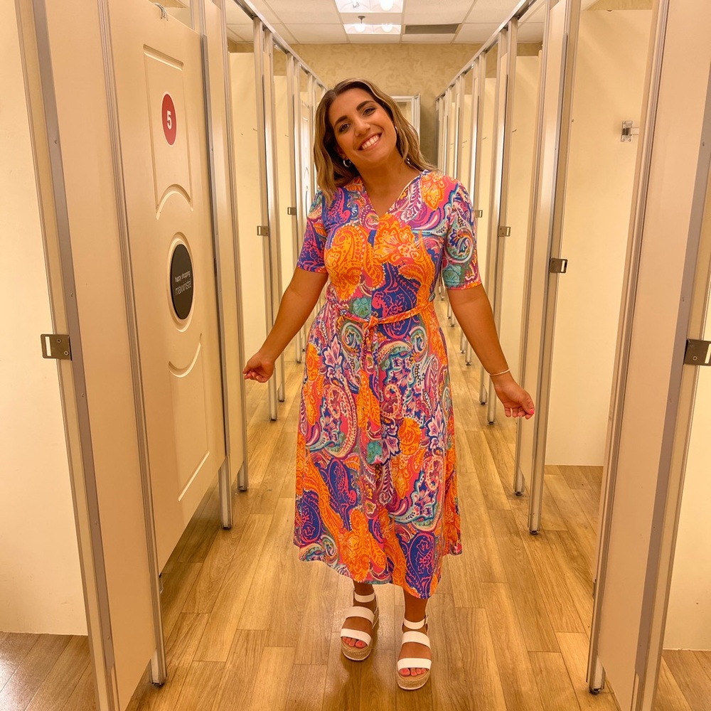 Beautiful vibrant size small dress! Only worn once to a wedding.